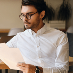 young-serious-businessman-in-eyeglasses-thoughtful-WU7QCKG.png
